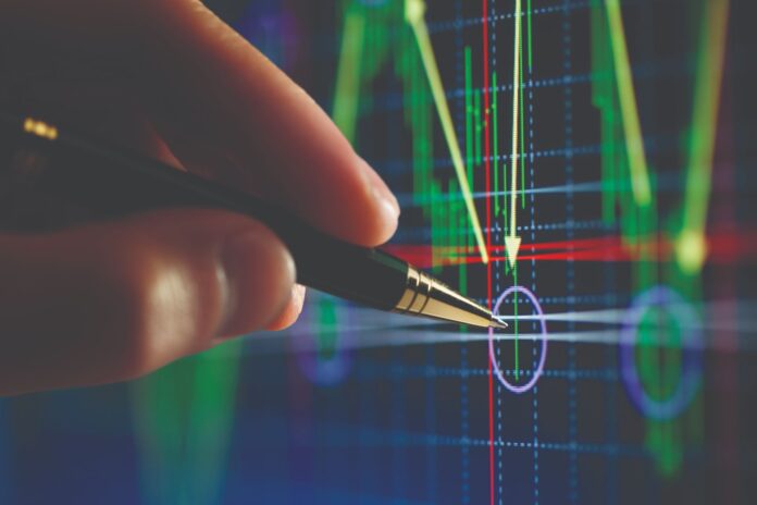 Hand and pen pointer, chart