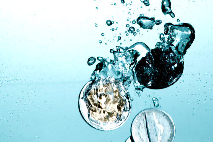 Sinking coins_900x600