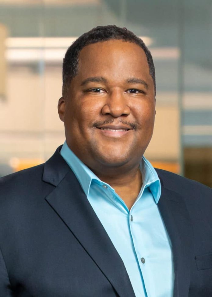 Ramon-Richards-headshot-smile-environmental-_300dpi_5x719-731x1024